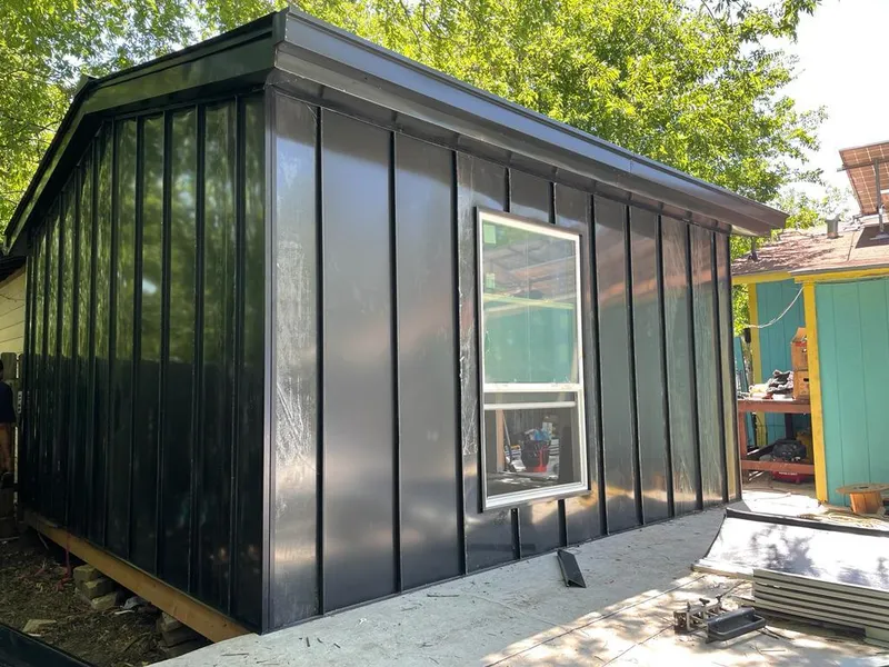 Black standing seam metal wall panels for Roof Inspection in Brambleton