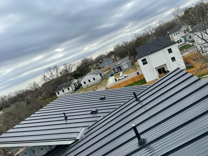 Standing seam metal roof panels with vents for Skylight Repair in Brambleton